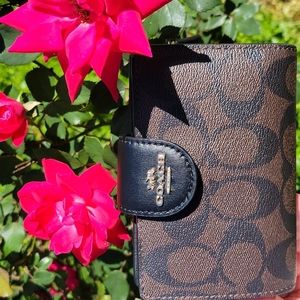 Signature coach wallet